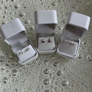 3 NWT pairs of CZ earrings🤍💜🤍